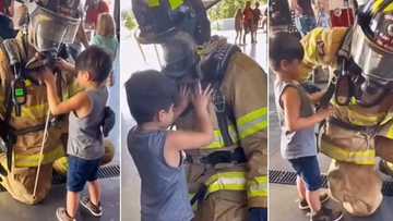 "Who's cutting onions?" Kind firefighter kneels as blind kid explores his gear in emotional video