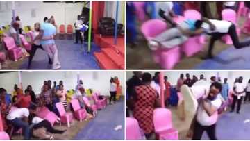 Pastor lifts man, throws him into the congregation during deliverance in video