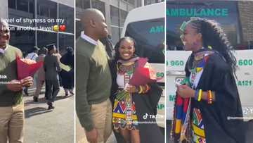 South African woman shares video showing adorable shy bae spoiling her on graduation: Ladies defend gentle men