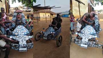Young inventor builds unique tricycle; takes it out for ride in photos