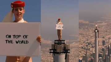 Air hostess climbs on top of world’s tallest building for 1-of-a-kind advert