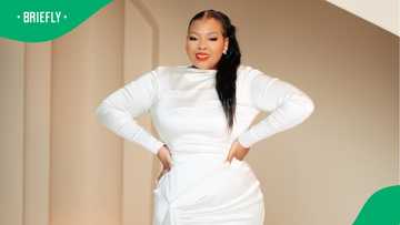 Anele Mdoda shows off her stunning curves in showstopper black dress