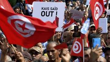 Tunisian protesters denounce 'coup', demand president's removal