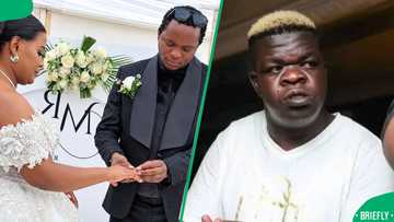 Mphela Mphela and Skomota share a kiss at his wedding while his wife watches