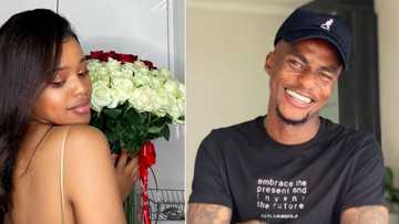 Natasha Thahane smiling from ear to ear with a bouquet of red roses from bae Lorch