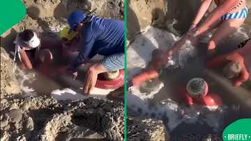 "Imagine if he was alone": Frantic beachgoers team up to save kids stuck in beach sand