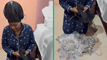 Woman saves over R10k with coins, TikTok video of container full of money leaves Mzansi in awe