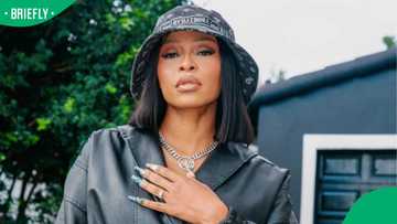 DJ Zinhle's trendy low-rise jeans and belly chains outfit divides Mzansi on social media
