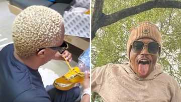 Customer service: Somizi humbles himself, gets his hands on his patron's feet, makes big announcement