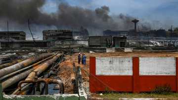 Cuba unable to identify remains of 14 firefighters after fuel plant blaze