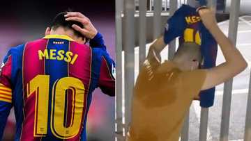Tears as Barcelona fan parks outside Camp Nou, filmed crying while holding Lionel Messi jersey