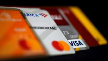 Italy partly bows to EU over card payments