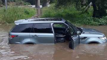 Joburg flooding: Impatient motorist forced to abandon luxury whip