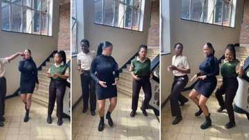 Teacher dancing with 2 pupils in school corridor is a whole mood: “Ama2k are having all the fun in the world”