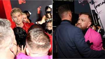 UFC star Conor Mcgregor & Machine Gun Kelly fight on the red carpet at MTV VMAs