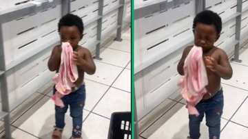 South African toddler throws tantrum after mom won't let her wear new clothes in store