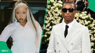 Uncle Waffles hangs with Pharrell Williams at the Louis Vuitton Fashion Show in Paris