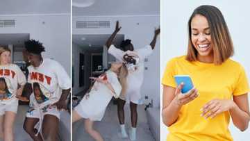 Man teaches bae how to dance to Afrobeats in cute video, peeps show the couple love: "Her smile is everything"