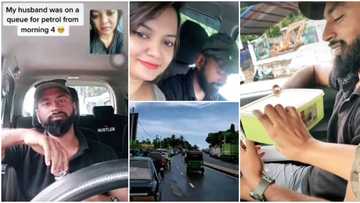 Doting wife traces husband to road where he is stuck in a long fuel queue, gives him food in cute video