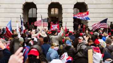 Trump supporters storm US congress, forcing police to draw guns