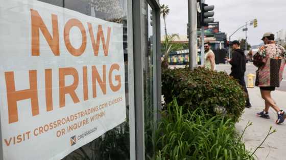 US hiring cooler than expected in July but wage gains hold steady