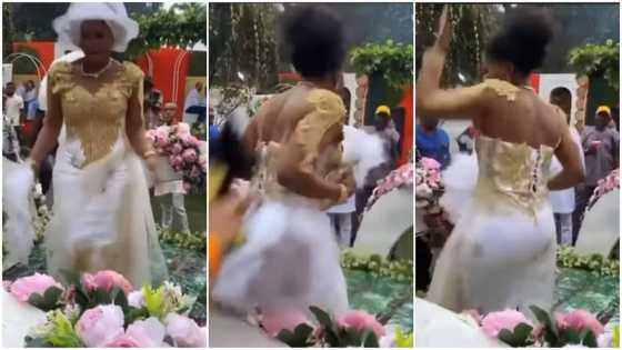 Young bride removes her gele, throws it away as she dances hard in viral video, husband looks surprised