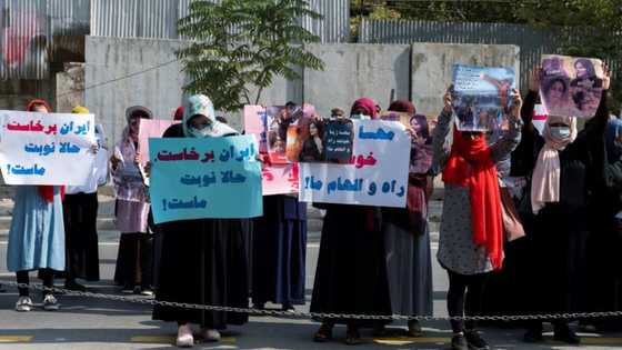 Taliban fire into air to disperse women's rally backing Iran protests