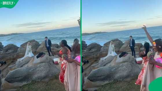 "Nice one guys": Mzansi women crash newlyweds' beach photoshoot in KZN in TikTok video, SA loves it