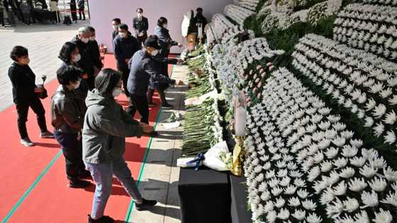 Grief, prayers and anger at South Korea crowd crush memorial