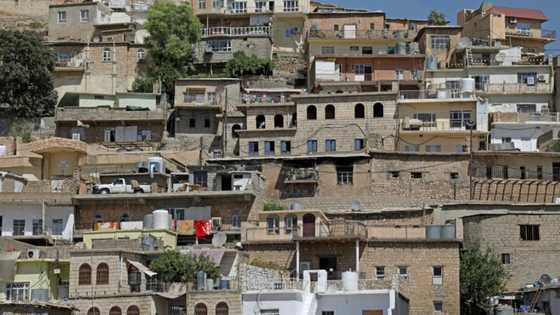 As Iraq concrete jungle swelters, ancient stone houses stay cool