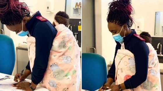 Local nurse holds baby while mom gets treated, photos go viral