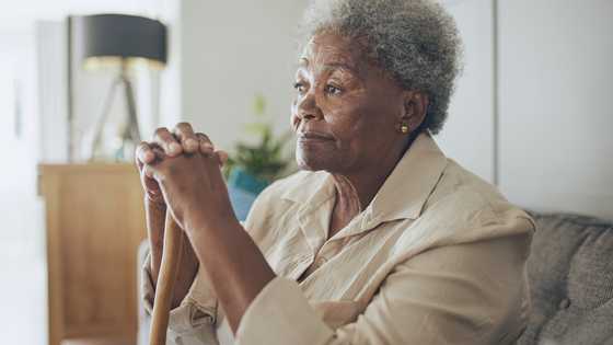 I thought a young man was helping my 83-year-old neighbor – Until I opened her bedroom door