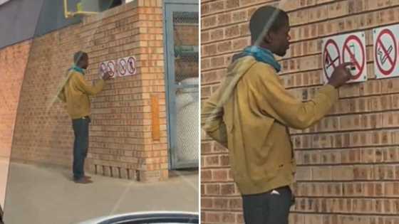 Video of man dialling numbers on picture of a cellphone on a warming sign has Mzansi people laughing hard