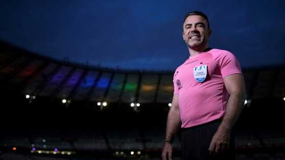 Removing 'camouflage,' Brazil football referee comes out