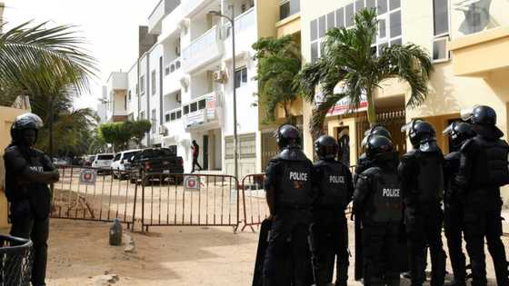 Senegal police surround opposition chief's home over protest call