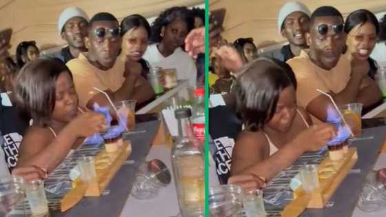 Woman in TikTok video struggles to drink fire shooter, SA laughs at her confusion mid-groove