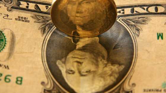 Asian stocks fall, euro nears dollar parity as recession fears build