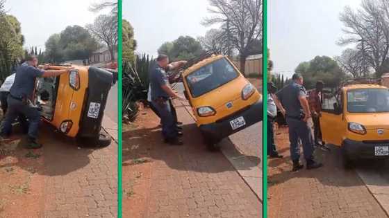 Police help 2 men push Bajaj back onto its wheels after toppling over, SA cracks jokes: "It's like a toy car"