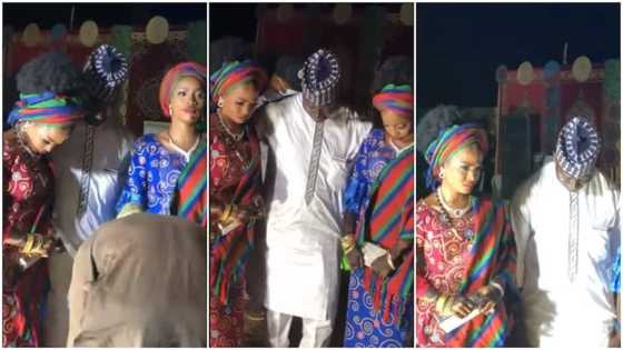 Are they fighting? Nigerians react as man dances with 2 young brides who look very sad in viral video