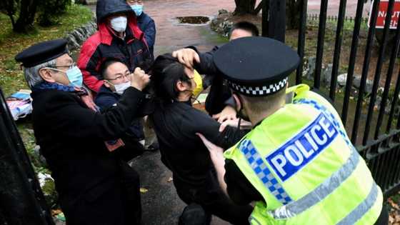 China blames 'troublemakers' after consulate protest assault in UK