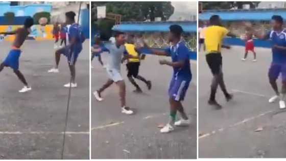 Footballer effortlessly dribbles his opponent in street soccer