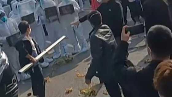 China's 'iPhone city' under Covid lockdown after violent clashes