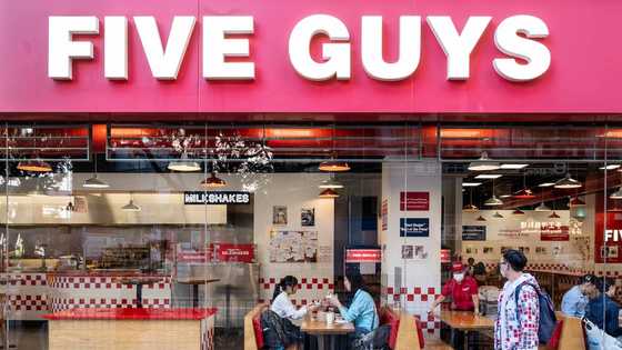 Who owns Five Guys? What role did Shaquille O’Neal play in its expansion?