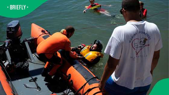 Friends jump back into rough Eastern Cape surf to save drowning tourist in dramatic beach rescue