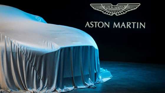 Carmaker Aston Martin's losses almost triple