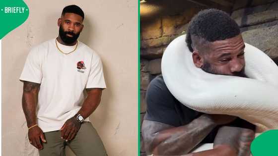 Man struggles to breathe as massive snake wraps around him in tense video