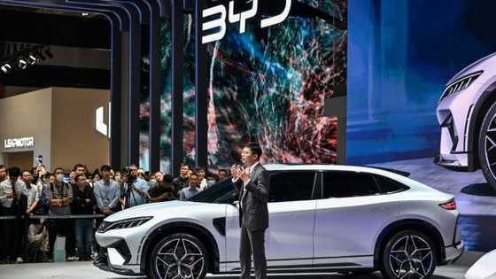 Chinese electric carmaker BYD triples half-year profit
