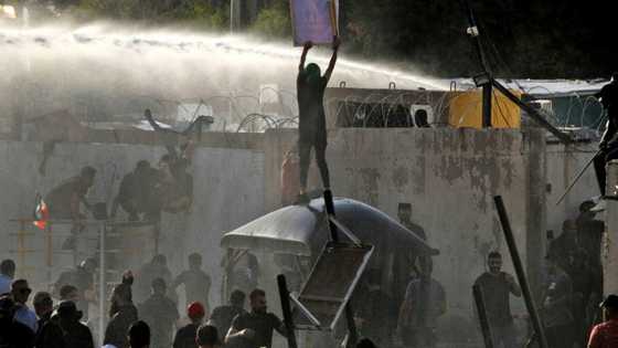 Iraq tensions soar as protesters rally against parliament occupation