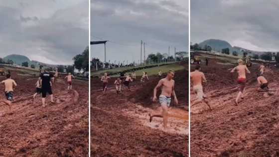 Video of men running in mud gets Mzansi males excited, claim this is what happens when women are not around