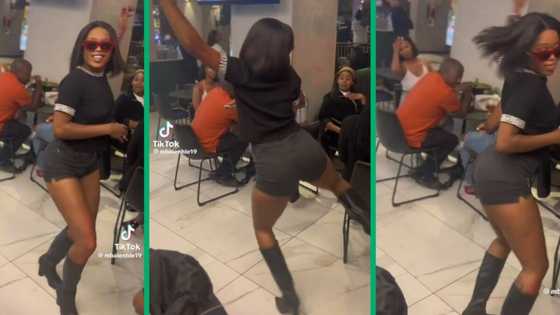 Gorgeous woman in shorts and boots performs fire Bacardi moves, SA hyped by video of dance routine